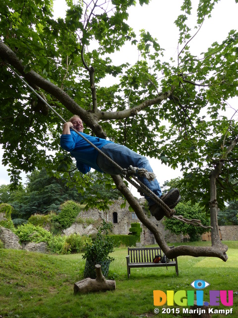 FZ018821 Marijn on rope swing in Usk Castle